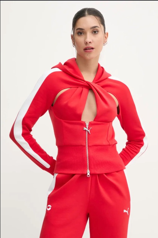 Model in the red cut-out hoodie and matching red pants